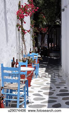 Cafe tables and chairs View Large Photo Image Stock Photograph - Cafe tables and chairs. Fotosearch
