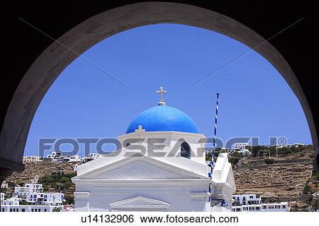 Stock Photograph - Church seen through an arch. Fotosearch