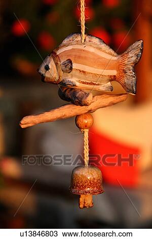 Stock Image - Fish wind chime. Fotosearch
