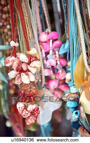 Shell necklaces displayed for sale View Large Photo Image Stock Photograph - Shell necklaces displayed for sale. Fotosearch