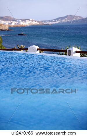 Swimming pool with sea view View Large Photo Image Stock Photograph - Swimming pool with sea view. Fotosearch