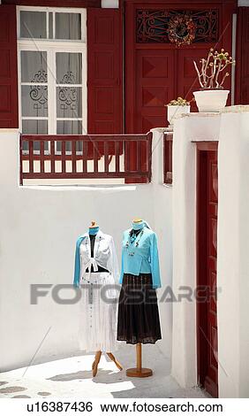 Two mannequins dressed in courtyard View Large Photo Image Stock Photograph - Two mannequins dressed in courtyard. Fotosearch