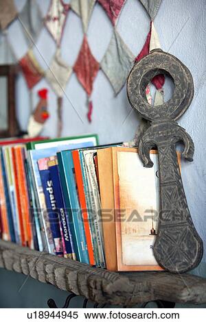 Bookshelf with travel books and novels View Large Photo Image Stock Photography - Bookshelf with travel books and novels. Fotosearch