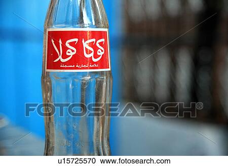 Stock Image - Coca Cola bottle in Arabic. Fotosearch