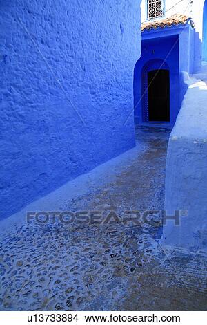 Picture - Doorway at end of alley. Fotosearch