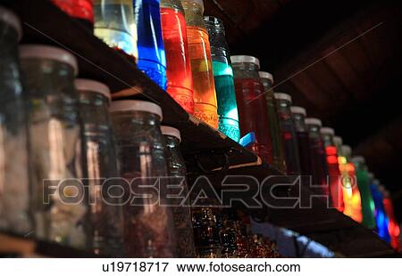 Stock Photo - Rows of colorful jars. Fotosearch