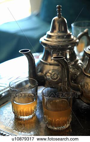 Stock Photo - Tea pots with glasses of tea. Fotosearch