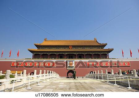 Stock Photography - China, Beijing, Tiananmen Square, Guard in front of chairmen Mao portrait. Fotosearch