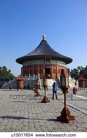Picture - China, Beijing, Woman taking a picture in Temple Of Heaven Park. Fotosearch