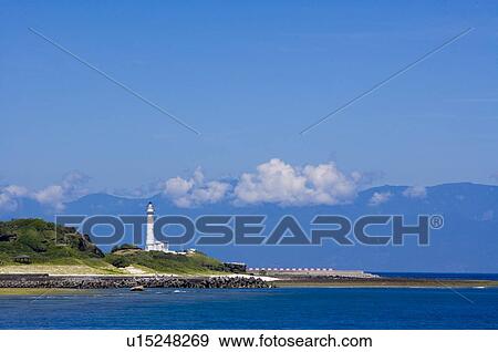 Stock Photo - Lighthouse by the sea on Green Island, Taitung County, Taiwan. Fotosearch