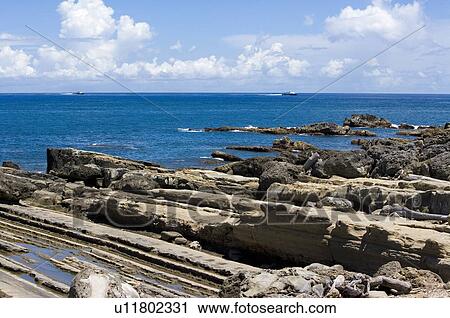 Little Yeliou, a place in Taitung County where one can view wave-eroded rocks, Taitung County, Taiwan View Large Photo Image Stock Image - Little Yeliou, a place in Taitung County where one can view wave-eroded rocks, Taitung County, Taiwan. Fotosearch