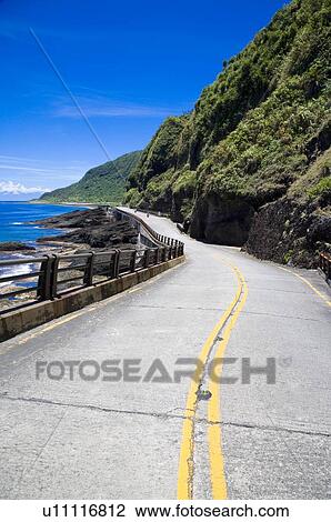 Stock Image - Road on Green Island, Taitung County, Taiwan. Fotosearch
