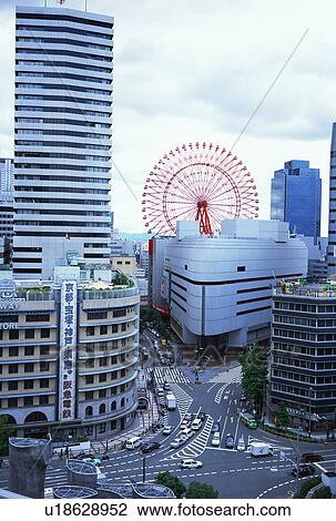 Stock Image - Buildings in Umeda, Osaka, Japan. Fotosearch