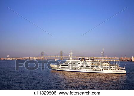 Ship goes near Yokohama Bay Bridge, Japan View Large Photo Image Stock Photograph - Ship goes near Yokohama Bay Bridge, Japan. Fotosearch