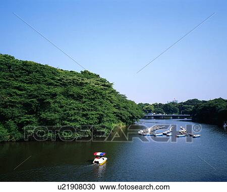 Stock Image - Boat floating at Chidorigafuchi, Tokyo, Japan. Fotosearch