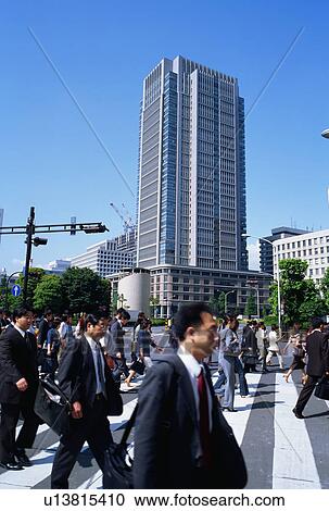 Stock Image - People walking to offices. Fotosearch