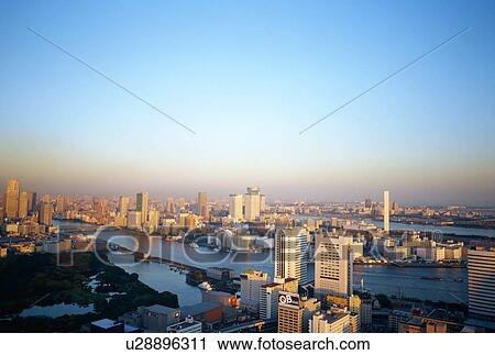 Stock Image - View of Tokyo, sunset. Fotosearch