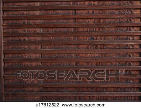 Stock Image - Close-up of wooden door. Fotosearch