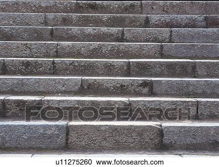 Stock Image - Stone steps, close-up. Fotosearch