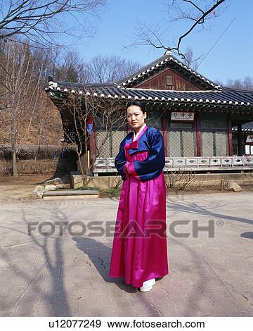 Stock Photo - A young woman in Korean traditional clothing. Fotosearch