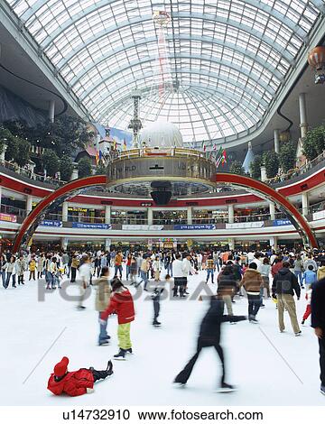 Stock Image - People skating. Fotosearch