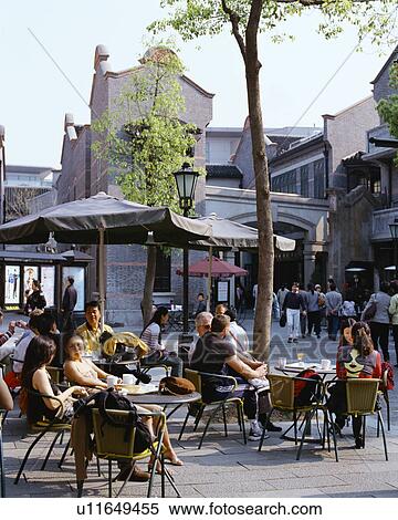 People relaxing at coffee shops in Shanghai, China View Large Photo Image Stock Photography - People relaxing at coffee shops in Shanghai, China. Fotosearch