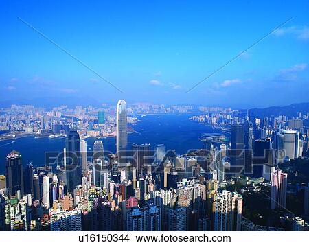 China, Hong Kong, skyscrapers and harbor, day, aerial view View Large Photo Image Picture - China, Hong Kong, skyscrapers and harbor, day, aerial view. Fotosearch