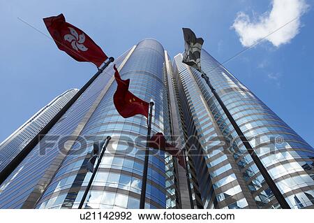 Hong Kong, Central District, flags and Stock Exchange exterior View Large Photo Image Stock Image - Hong Kong, Central District, flags and Stock Exchange exterior. Fotosearch