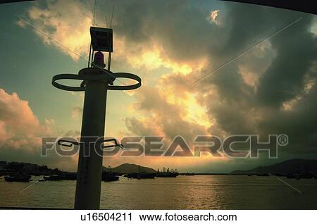 Illuminated lamp on pier, dusk, Cheung Chau View Large Photo Image Stock Image - Illuminated lamp on pier, dusk, Cheung Chau. Fotosearch