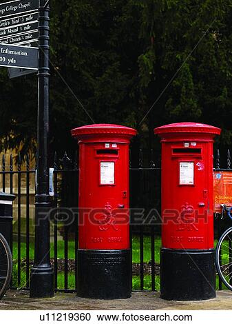 Stock Image - Two Royal Mailboxes on Street. Fotosearch