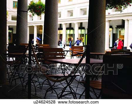 Wooden Tables and Chairs at a Sidewalk Cafe View Large Photo Image Stock Photo - Wooden Tables and Chairs at a Sidewalk Cafe. Fotosearch