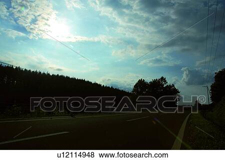 Country road in rural landscape, Biei, Hokkaido, Japan View Large Photo Image Stock Photo - Country road in rural landscape, Biei, Hokkaido, Japan. Fotosearch
