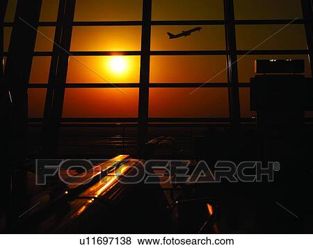 Plane taking off, Sunset, Shanghai's Pudong International Airport View Large Photo Image Stock Photo - Plane taking off, Sunset, Shanghai's Pudong International Airport. Fotosearch