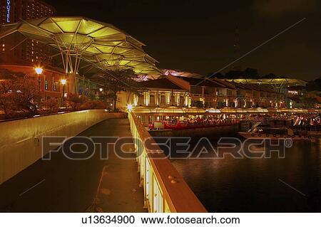 Stock Image - Riverside Point restaurants and cafes along Singapore River. Fotosearch