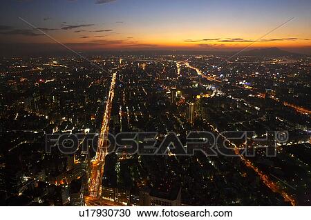 Stock Image - Taiwan, Taipei, Cityscape at Sunset, Elevated view from Taipei 101 building. Fotosearch