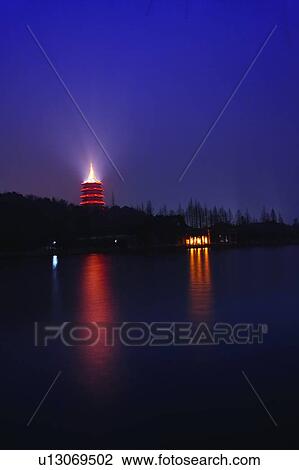 Stock Image - The Six Harmonies Pagoda, West Lake in Hangzhou, Zhejiang Province, People Republic of China. Fotosearch