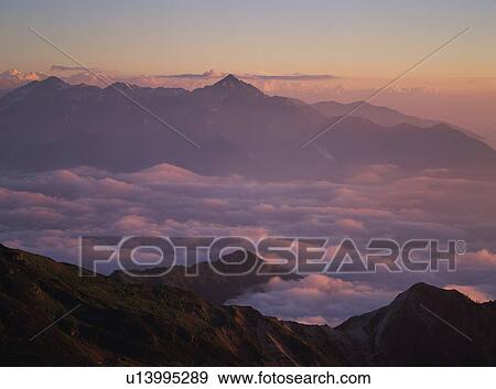 Stock Photo - Clouds on mountain in Japan. Fotosearch