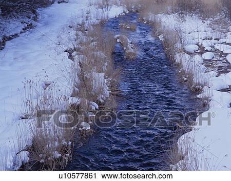 Snow covered land and river View Large Photo Image Stock Image - Snow covered land and river. Fotosearch
