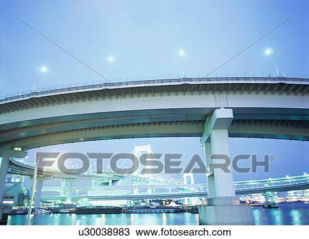 Stock Image - Rainbow Bridge at night. Fotosearch