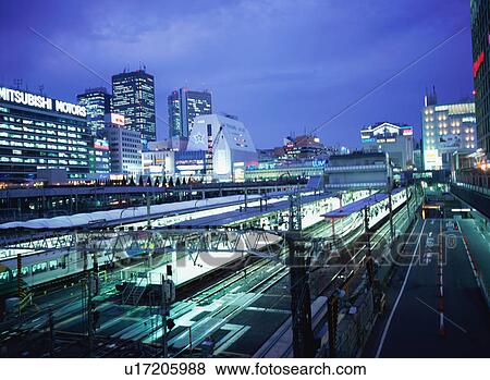 Stock Photo - Shinjuku Station at night. Fotosearch