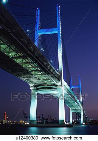 Stock Image - Yokohama Bay Bridge at night. Fotosearch