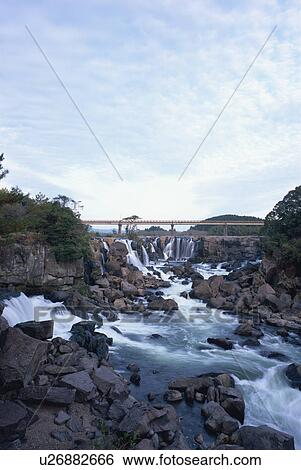 Stock Photograph - Sogi Waterfall, Kagoshima Prefecture, Japan. Fotosearch