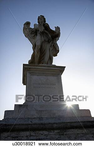 Stock Image - Angel sculpture from Ponte Sant'Angelo bridge in Rome, Italy.. Fotosearch