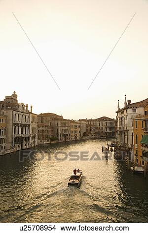 Picture - Buildings and boat on canal in Venice, Italy.. Fotosearch