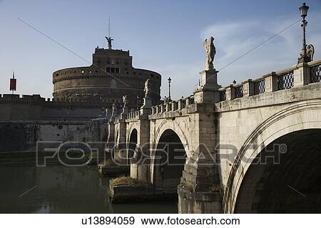 Ponte Sant'Angelo bridge and Castel Sant'Angelo in Rome, Italy. View Large Photo Image Stock Photo - Ponte Sant'Angelo bridge and Castel Sant'Angelo in Rome, Italy.. Fotosearch