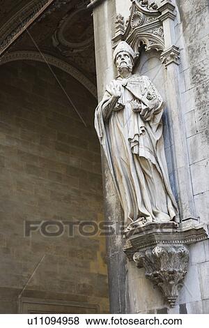 Stock Photo - Statue on side of church in Siena.. Fotosearch