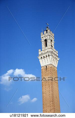 Stock Image - Torre del Mangia tower in Siena, Itlay.. Fotosearch