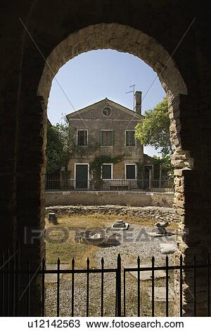 View of Italian dwelling through arched masonry passageway. View Large Photo Image Stock Image - View of Italian dwelling through arched masonry passageway.. Fotosearch