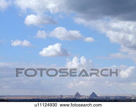 Stock Image - Egypt, Pyramids, Sky, Clouds. Fotosearch