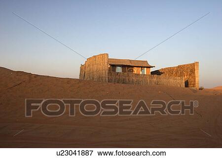Stock Photo - sand, dubai, desert, uae, emirates, camp, local. Fotosearch